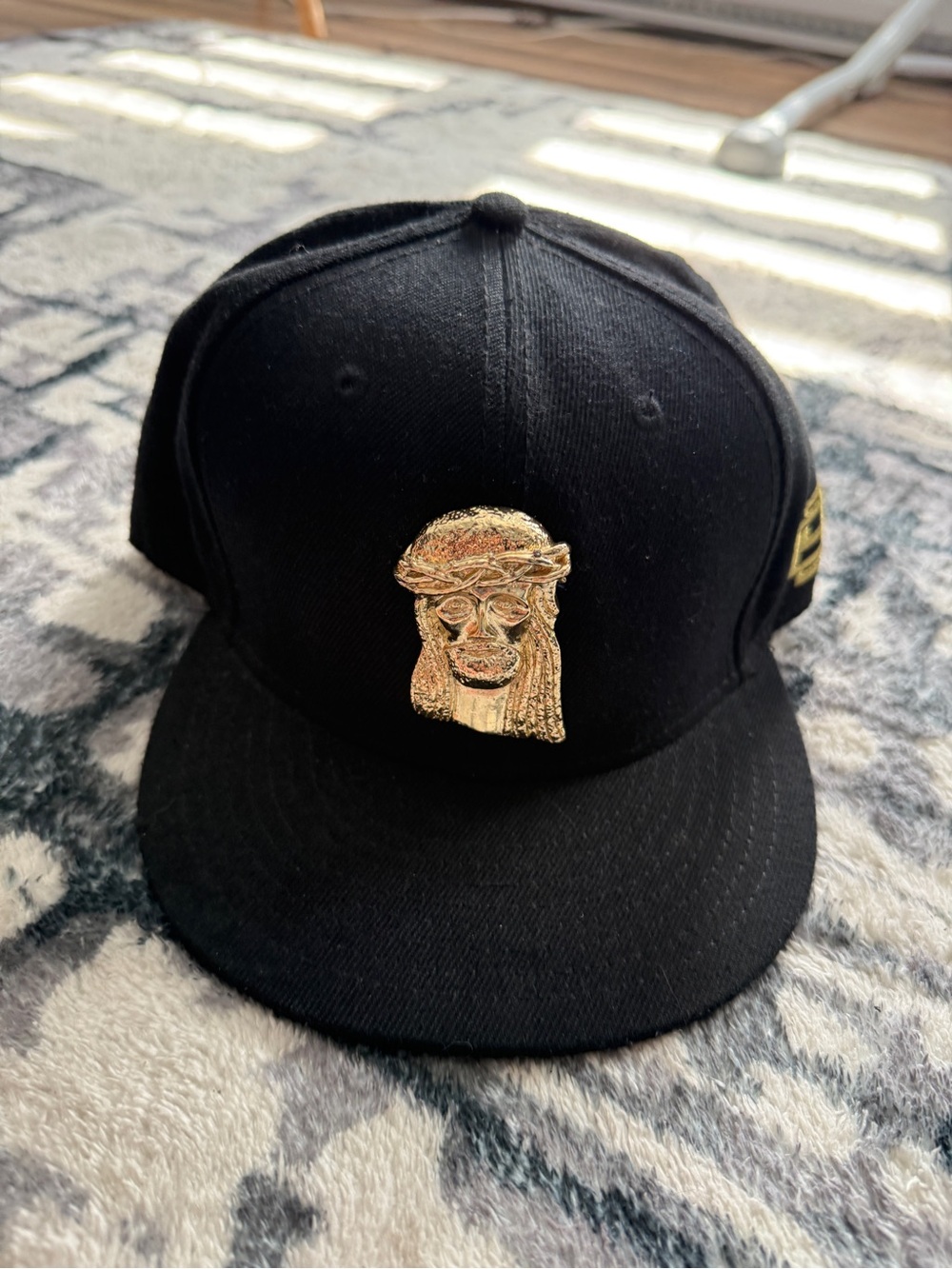 Black Cap with Gold Jesus piece